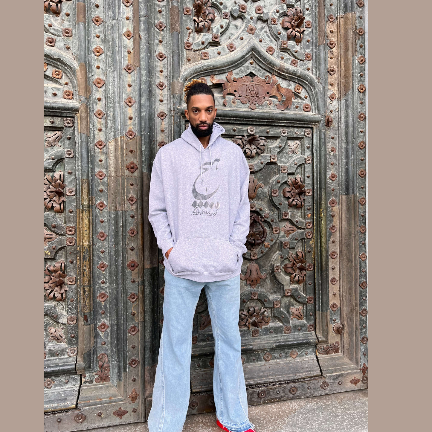 Unisex Persian calligraphy hoodie with ‘Hich’ design – gray Farsi sweatshirt, cultural streetwear gift idea, stylish fashion for USA and Canada shoppers.