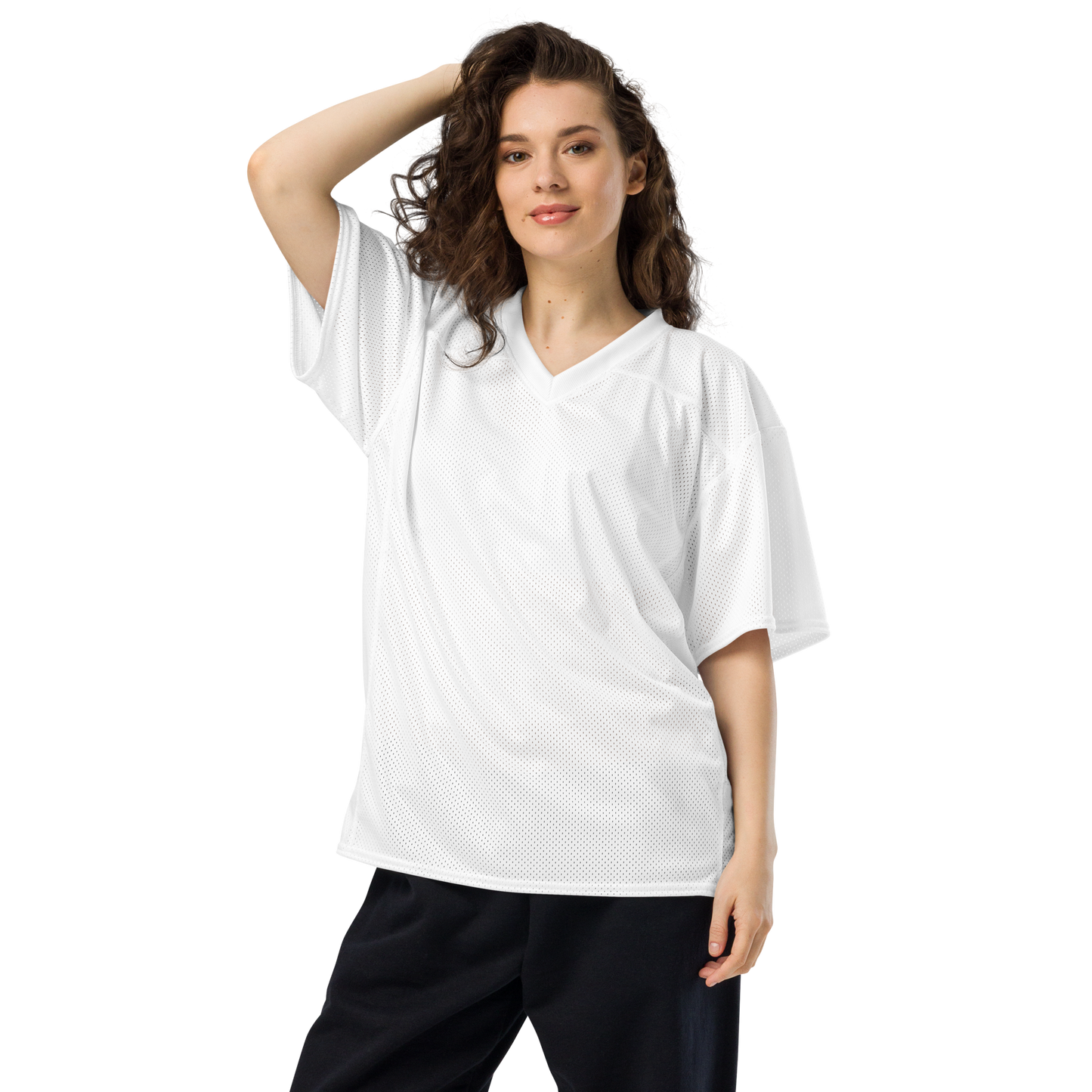 Woman wearing a white oversized t-shirt on a white background