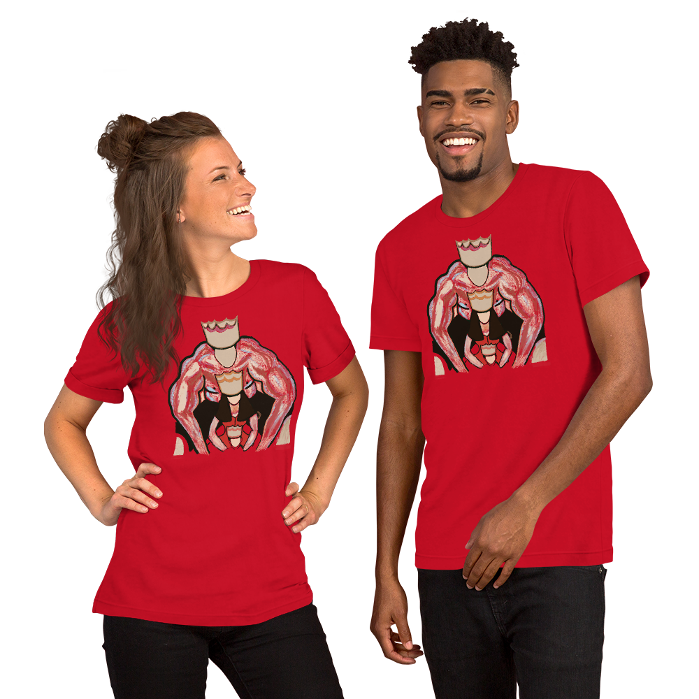 Red t-shirt with a striking graphic design featuring a muscular king and queen in a powerful embrace, displayed on a light wooden background with festive decorations and gift boxes.