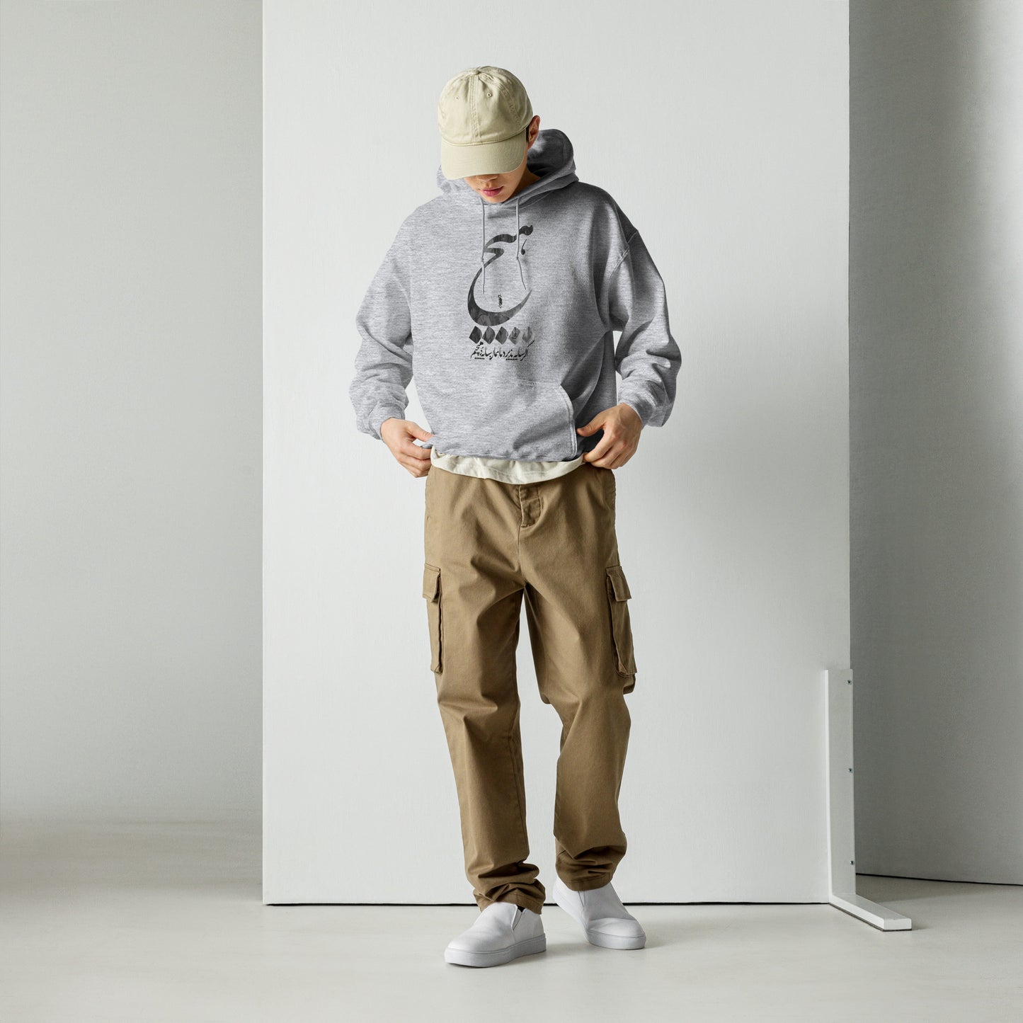 Gray Farsi hoodie with ‘Hich’ (هیچ) Persian lettering – trendy unisex streetwear, cultural graphic sweatshirt for urban fashion lovers in USA and Canada.